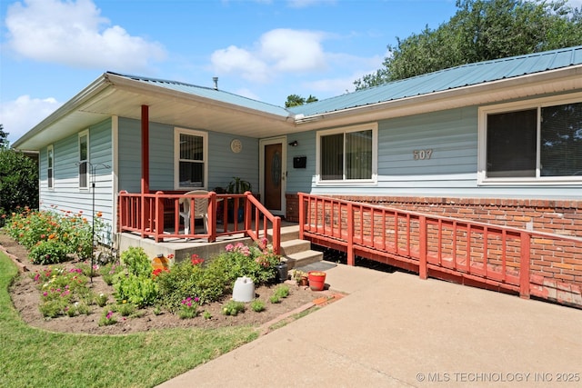 507 S Thompson, Vinita, OK 74301 - view of front of home featuring a metal roof