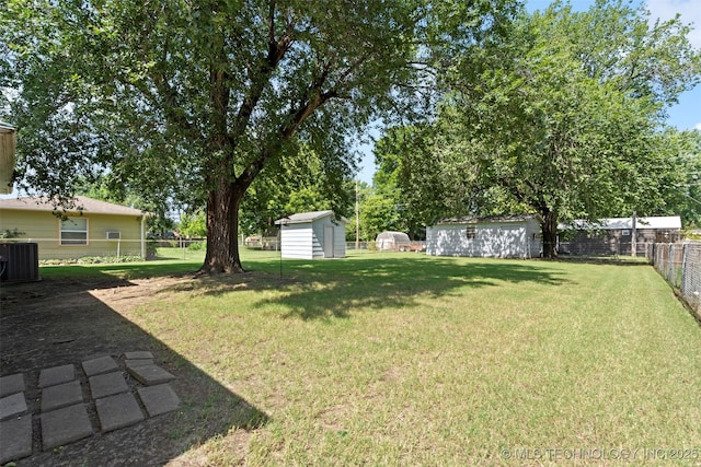 507 S Thompson, Vinita, OK 74301 - fenced backyard featuring a storage unit
