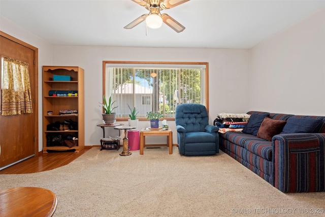 507 S Thompson, Vinita, OK 74301 - living room featuring carpet floors and a ceiling fan