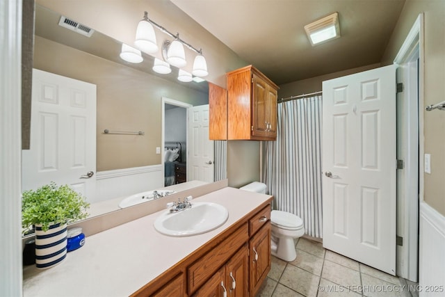 12708 E 78th St, Owasso, OK 74055 - full bathroom featuring vanity, tile patterned floors, and curtained shower