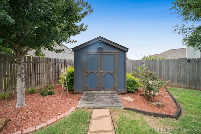 12708 E 78th St, Owasso, OK 74055 - view of shed with a fenced backyard