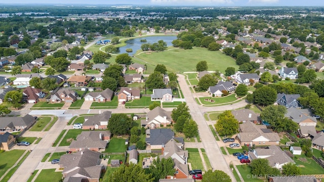 12708 E 78th St, Owasso, OK 74055 - aerial overview of property's location featuring a nearby body of water and nearby suburban area