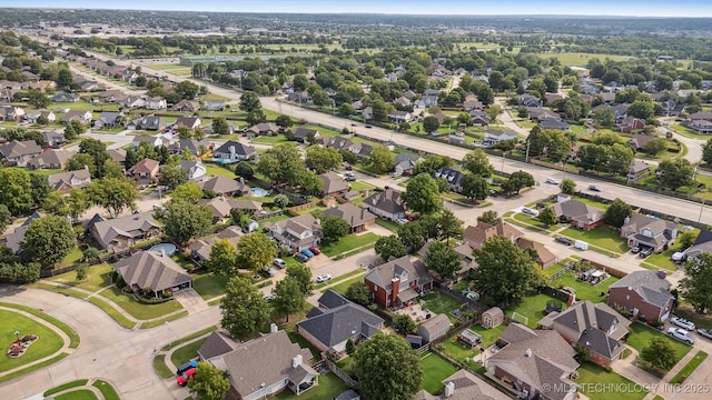 12708 E 78th St, Owasso, OK 74055 - aerial view of property and surrounding area featuring nearby suburban area