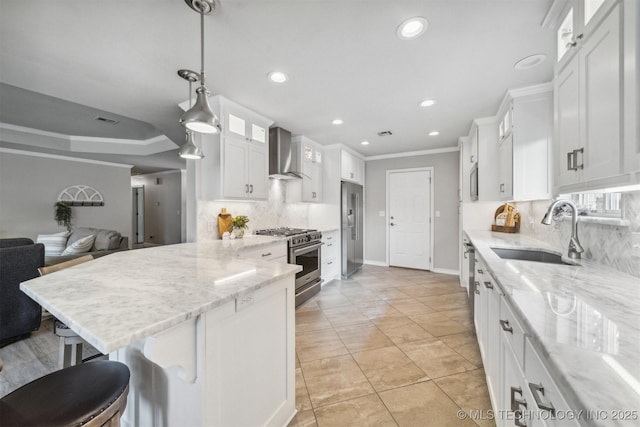 12708 E 78th St, Owasso, OK 74055 - kitchen featuring high quality appliances, wall chimney exhaust hood, a peninsula, white cabinets, and glass insert cabinets