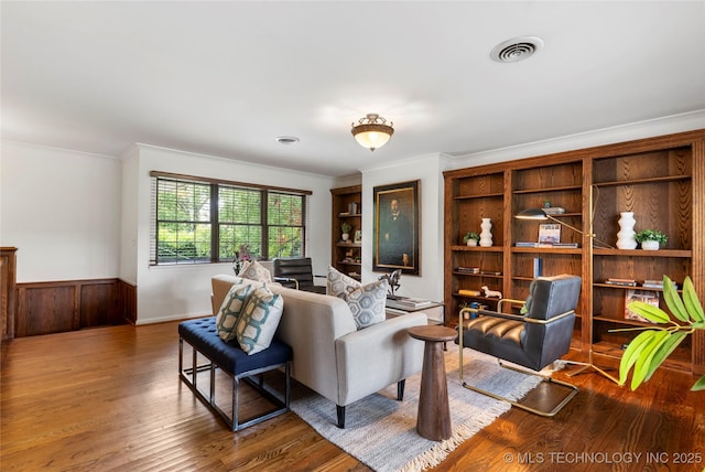 4146 S Birmingham Pl, Tulsa, OK 74105 - living area with wood finished floors, ornamental molding, and a wainscoted wall