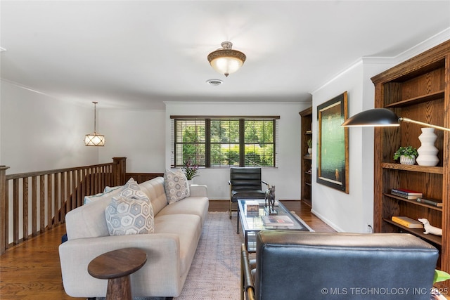 4146 S Birmingham Pl, Tulsa, OK 74105 - living area with wood finished floors and crown molding