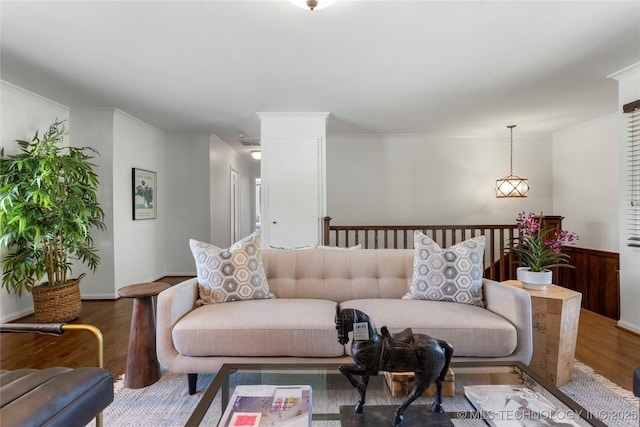 4146 S Birmingham Pl, Tulsa, OK 74105 - living area with wood finished floors, ornamental molding, and wainscoting