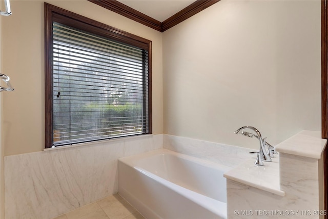 4146 S Birmingham Pl, Tulsa, OK 74105 - bathroom featuring ornamental molding, a garden tub, and tile patterned floors