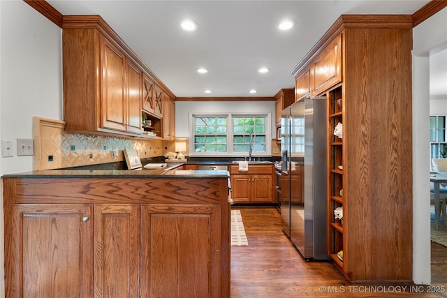 4146 S Birmingham Pl, Tulsa, OK 74105 - kitchen featuring stainless steel fridge with ice dispenser, dark countertops, open shelves, a peninsula, and dark wood-style floors