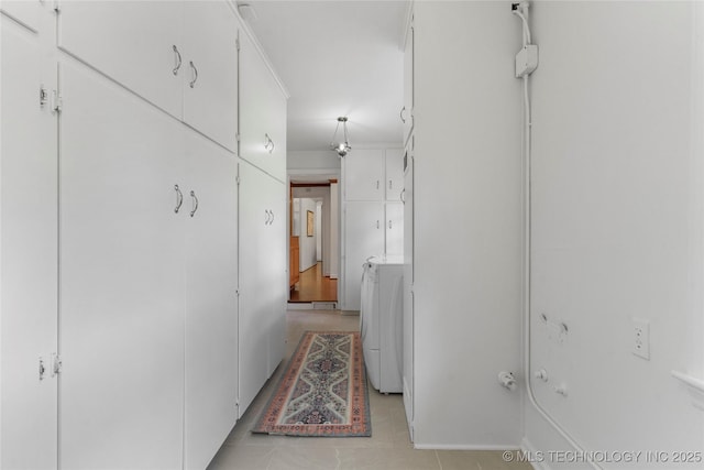 4146 S Birmingham Pl, Tulsa, OK 74105 - hallway featuring washer / clothes dryer and light tile patterned floors