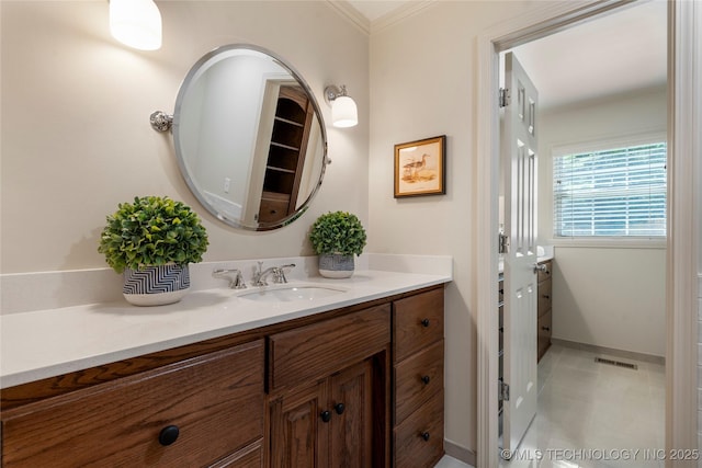 4146 S Birmingham Pl, Tulsa, OK 74105 - bathroom with vanity, tile patterned floors, and ornamental molding