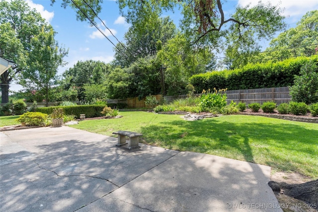 4146 S Birmingham Pl, Tulsa, OK 74105 - fenced backyard with a patio