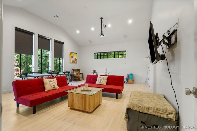 3918 S Evanston Ave, Tulsa, OK 74105 - living area featuring lofted ceiling, healthy amount of natural light, light wood-style flooring, and recessed lighting