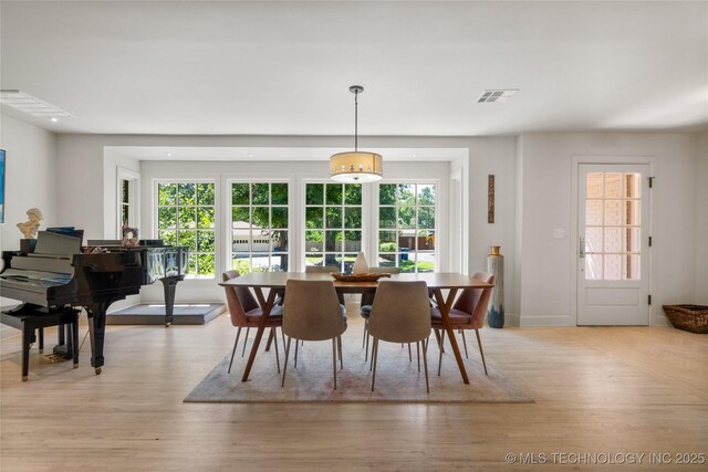 3918 S Evanston Ave, Tulsa, OK 74105 - dining area with light wood-type flooring and recessed lighting