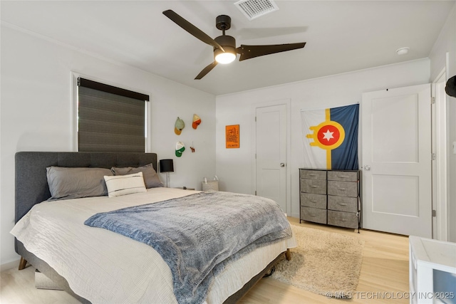 3918 S Evanston Ave, Tulsa, OK 74105 - bedroom with light wood-style floors and a ceiling fan