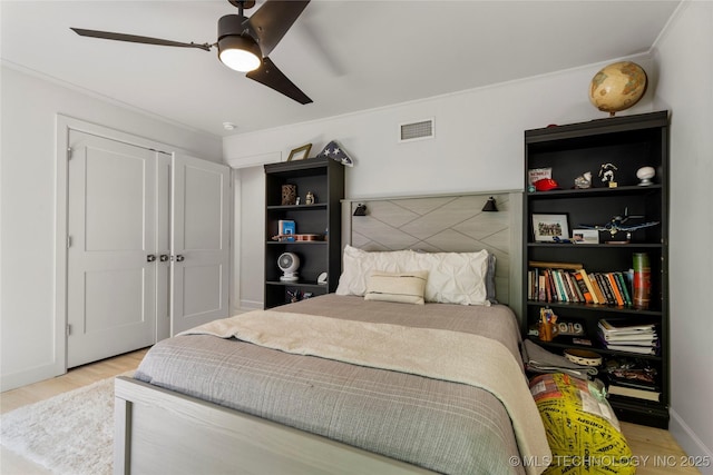 3918 S Evanston Ave, Tulsa, OK 74105 - bedroom featuring wood finished floors, ornamental molding, and a ceiling fan