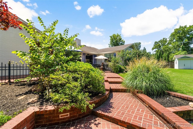 3918 S Evanston Ave, Tulsa, OK 74105 - view of patio / terrace featuring a storage shed