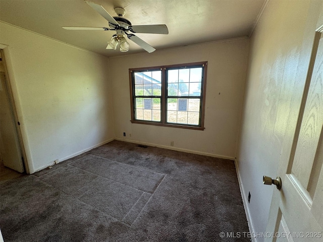 611 Crutchmer Ave, Okmulgee, OK 74447 - carpeted empty room with ceiling fan and crown molding