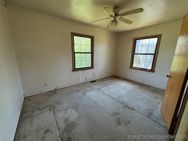 611 Crutchmer Ave, Okmulgee, OK 74447 - carpeted empty room with ceiling fan and baseboards