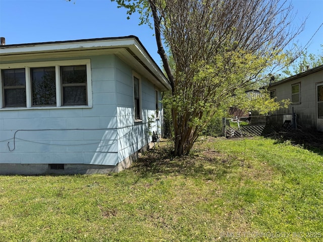 611 Crutchmer Ave, Okmulgee, OK 74447 - view of home's exterior featuring crawl space