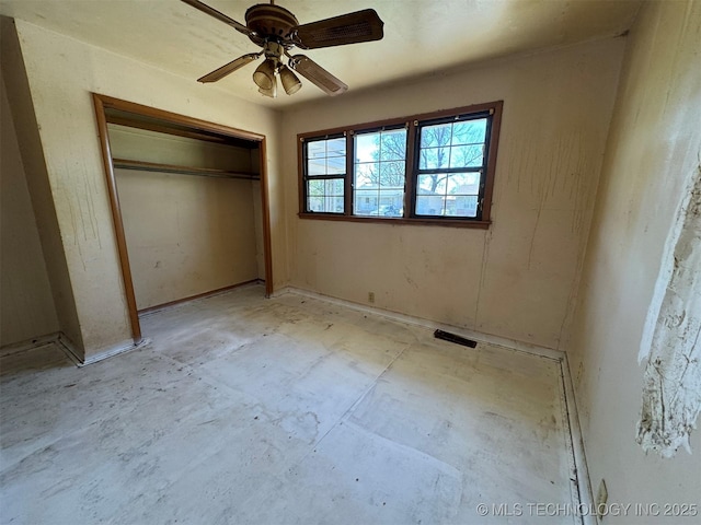 611 Crutchmer Ave, Okmulgee, OK 74447 - unfurnished bedroom featuring a closet and a ceiling fan