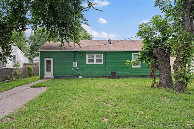 345 N Pine, Dewey, OK 74029 - back of house with roof with shingles