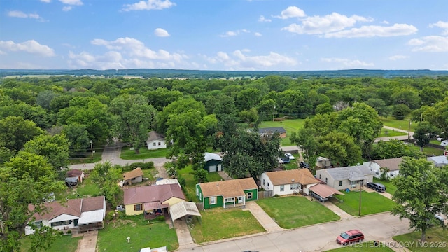 345 N Pine, Dewey, OK 74029 - aerial view of residential area featuring a forest