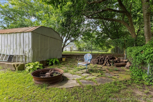 817 S Stockton, Ada, OK 74820 - view of yard with a storage shed