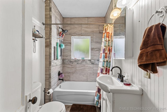 817 S Stockton, Ada, OK 74820 - bathroom featuring vanity and shower / bath combo with shower curtain