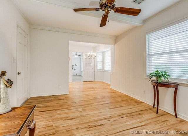 5610 S 75th E Pl, Tulsa, OK 74145 - spare room featuring light wood-type flooring, ceiling fan, a chandelier, and ornamental molding