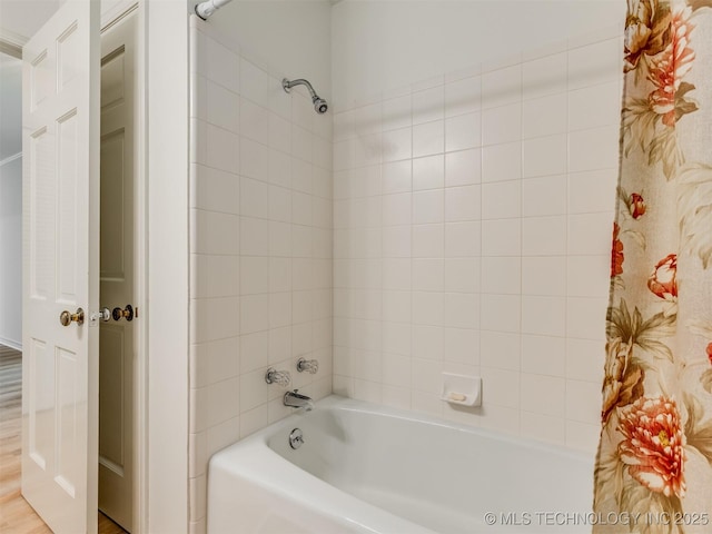 5610 S 75th E Pl, Tulsa, OK 74145 - full bath with shower / tub combo and wood finished floors