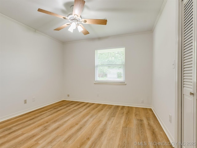 5610 S 75th E Pl, Tulsa, OK 74145 - unfurnished bedroom with light wood finished floors, crown molding, a ceiling fan, and a closet