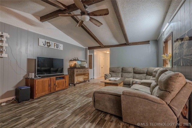 920 Ridge Oak Rd, Sapulpa, OK 74066 - living room with dark wood-style floors, ceiling fan, a textured ceiling, and wood walls