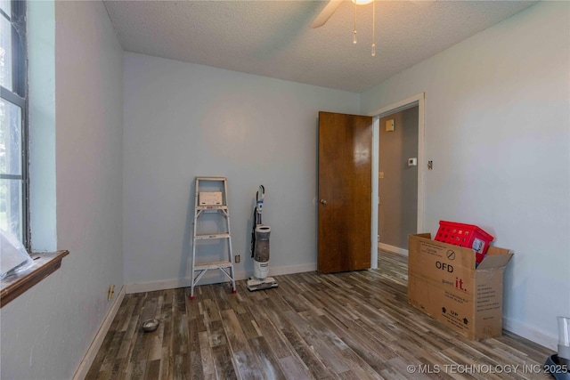 920 Ridge Oak Rd, Sapulpa, OK 74066 - empty room with wood finished floors, ceiling fan, and a textured ceiling