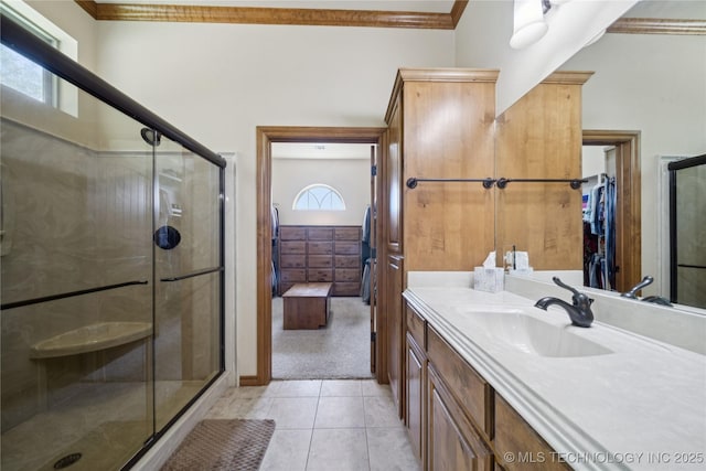 7355 E 453rd Rd, Claremore, OK 74017 - full bathroom featuring ornamental molding, vanity, a stall shower, tile patterned flooring, and connected bathroom
