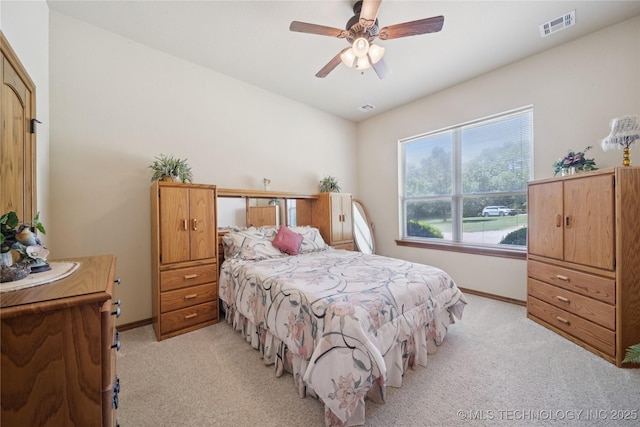 7355 E 453rd Rd, Claremore, OK 74017 - bedroom with light carpet and ceiling fan