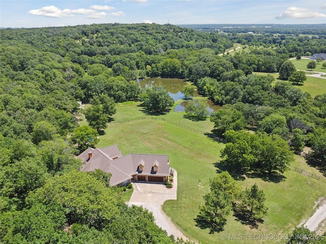 7355 E 453rd Rd, Claremore, OK 74017 - aerial view of property and surrounding area with a nearby body of water and a heavily wooded area