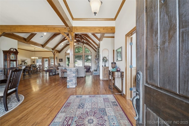 7355 E 453rd Rd, Claremore, OK 74017 - entrance foyer featuring beamed ceiling, light wood-type flooring, a chandelier, and high vaulted ceiling