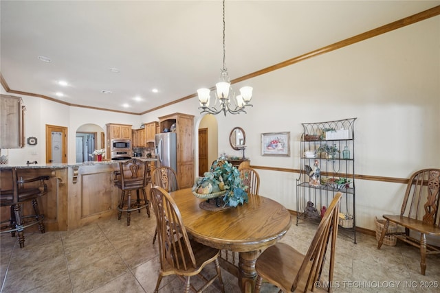 7355 E 453rd Rd, Claremore, OK 74017 - dining space with arched walkways, ornamental molding, a chandelier, and light tile patterned floors