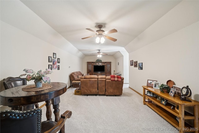 7355 E 453rd Rd, Claremore, OK 74017 - living room featuring light carpet, a ceiling fan, and vaulted ceiling