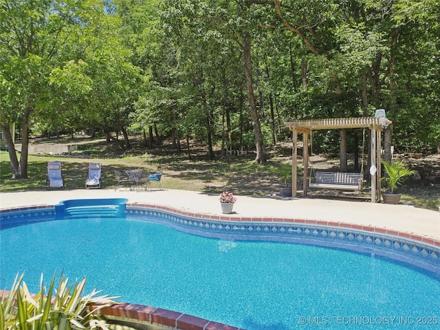 7355 E 453rd Rd, Claremore, OK 74017 - outdoor pool featuring a pergola and a patio area