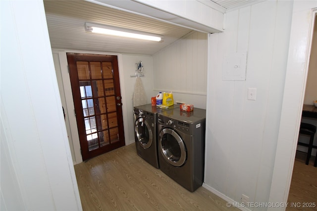 2216 E 8th St, Tulsa, OK 74104 - laundry area featuring light wood-type flooring and washing machine and clothes dryer