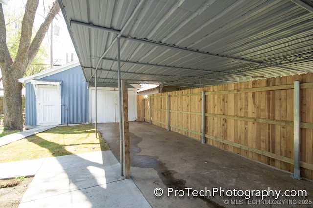 2216 E 8th St, Tulsa, OK 74104 - garage with a carport