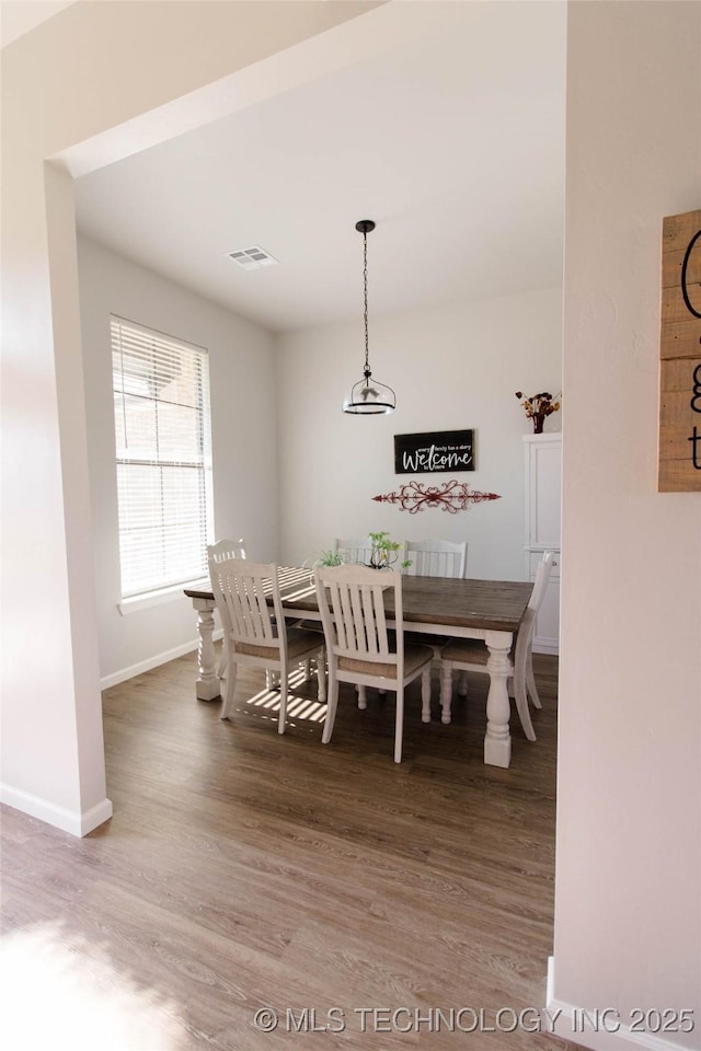 11940 County Road 3513, Ada, OK 74820 - dining area featuring wood finished floors and baseboards