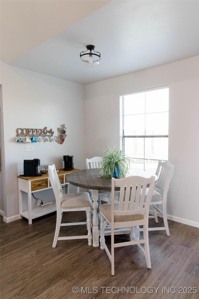 11940 County Road 3513, Ada, OK 74820 - dining area featuring baseboards and wood finished floors