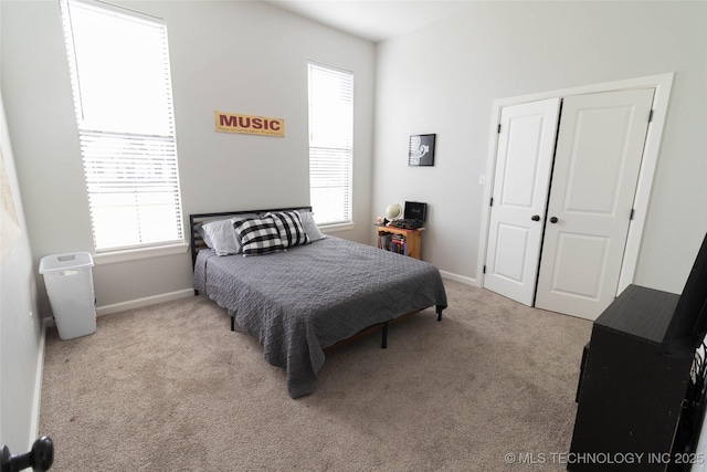 11940 County Road 3513, Ada, OK 74820 - bedroom featuring multiple windows, carpet floors, and a closet