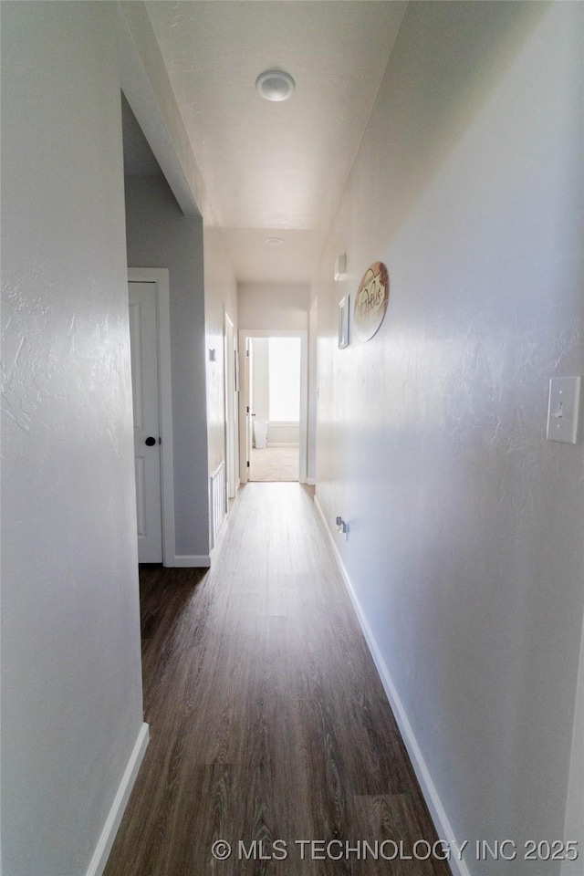 11940 County Road 3513, Ada, OK 74820 - corridor with baseboards and wood finished floors