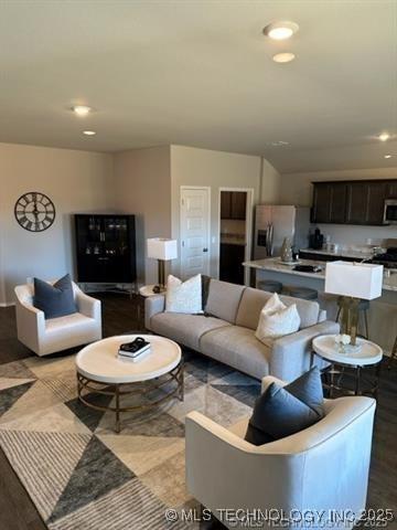 8308 E Oakland St, Broken Arrow, OK 74014 - living room featuring recessed lighting