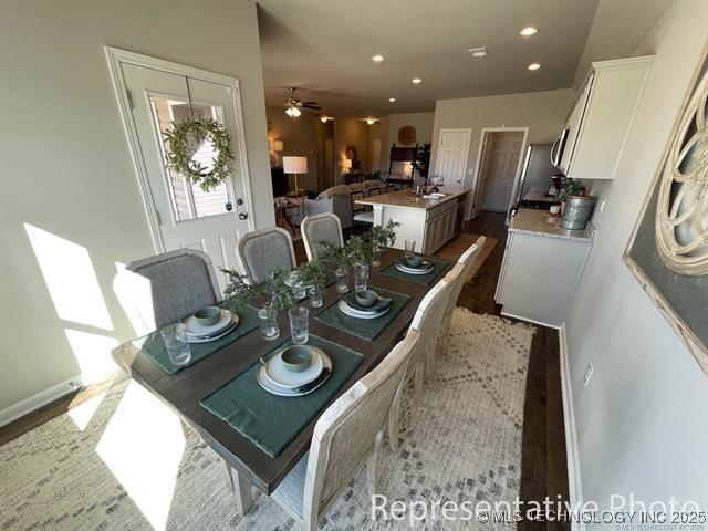 8308 E Oakland St, Broken Arrow, OK 74014 - dining room with ceiling fan and recessed lighting