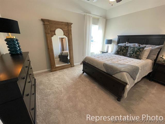 8308 E Oakland St, Broken Arrow, OK 74014 - bedroom featuring light colored carpet and ceiling fan